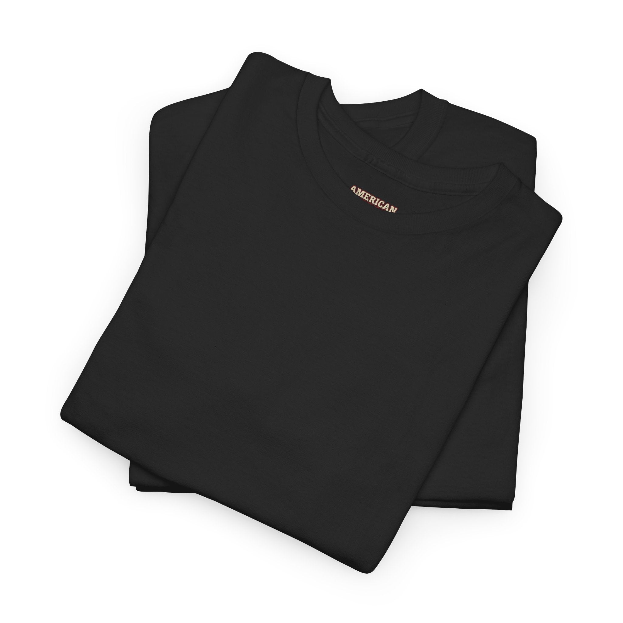 Folded black t-shirt with a circular logo on a white background