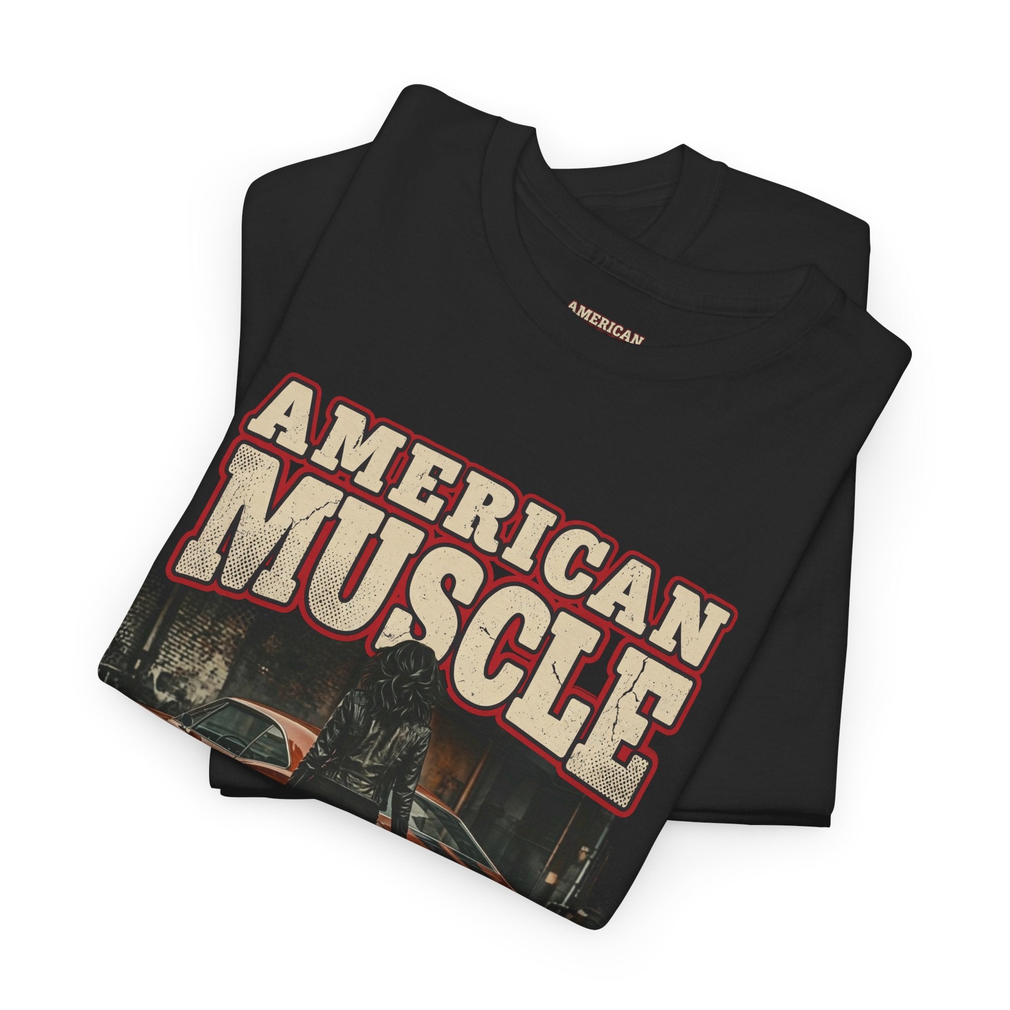 Folded black t-shirt with 'American Muscle' text on a white background