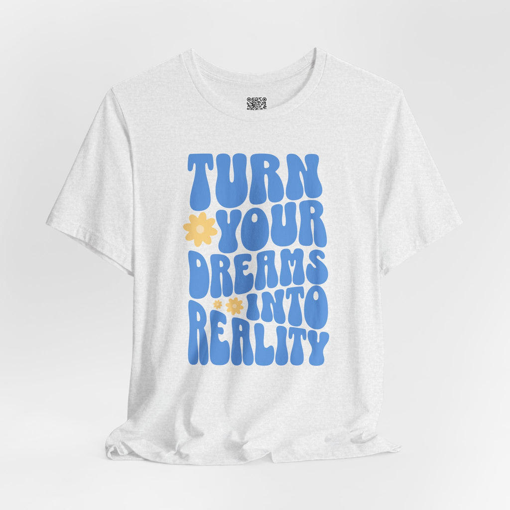 White Retro Flower Positive Message T-Shirt with blue text and yellow flowers, reading "Turn Your Dreams Into Reality".