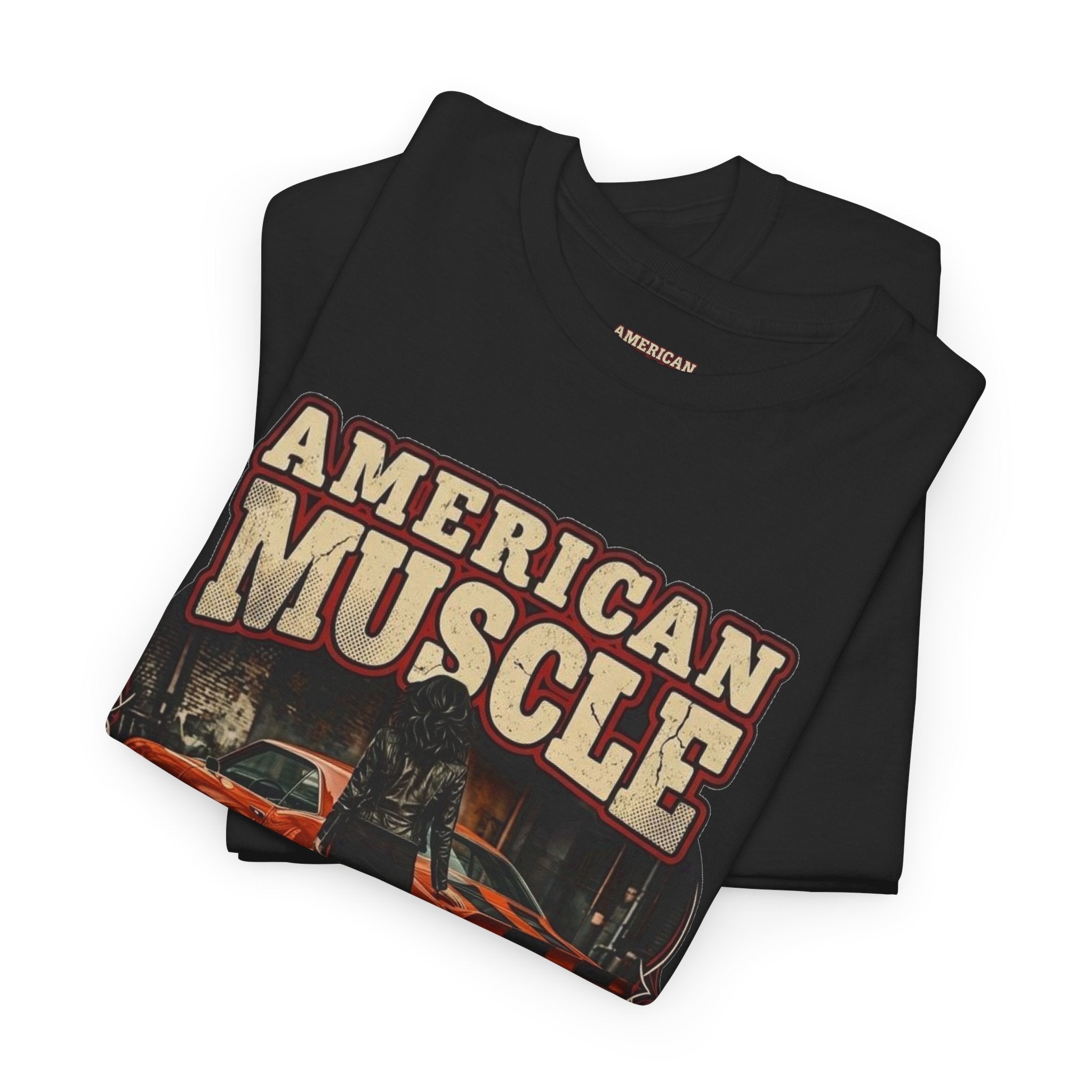 Folded black t-shirt with 'American Muscle' graphic design on a white background