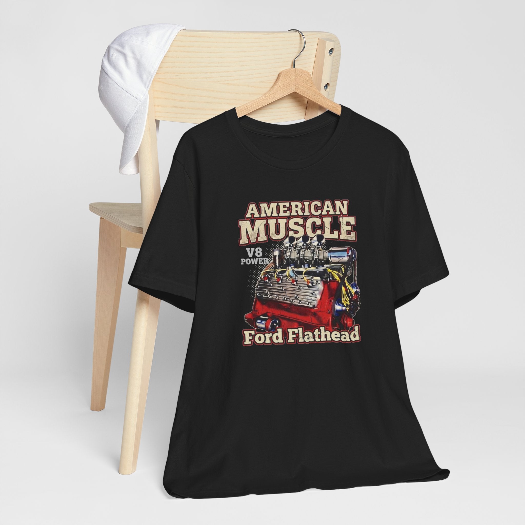 Person wearing a black t-shirt with 'American Muscle' and 'Ford Flathead' graphic design.