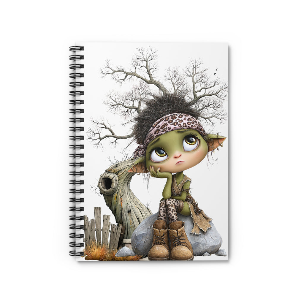 Whimsical fairy spiral notebook with a cute creature wearing a leopard print headband sitting on a rock.