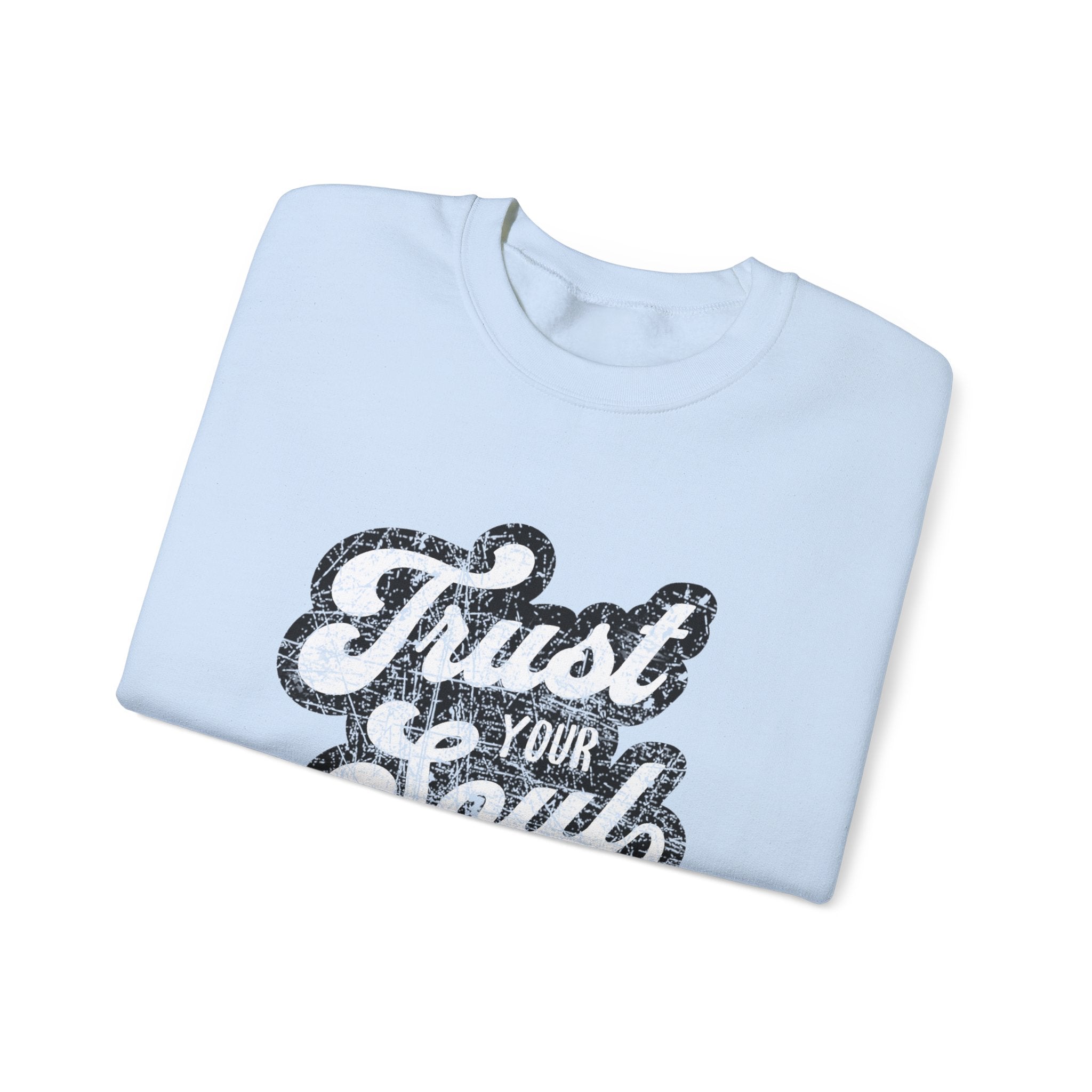 Light blue Trust Your Soul unisex crewneck sweatshirt, folded, with distressed black and white text on white background