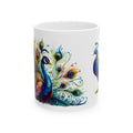 White ceramic peacock mug with colorful watercolor plumage and whimsical bird art on a glossy surface.