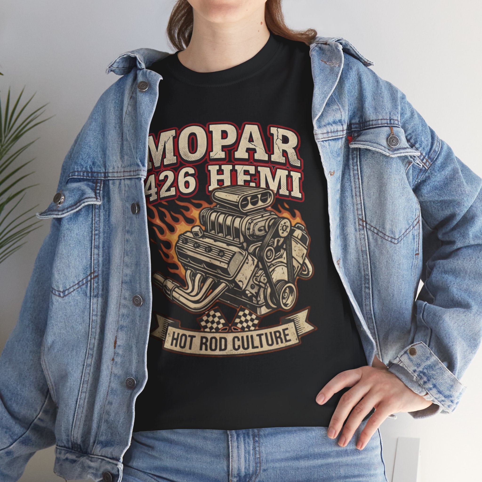 Person wearing a black t-shirt with Mopar 426 Hemi design, paired with a denim jacket.