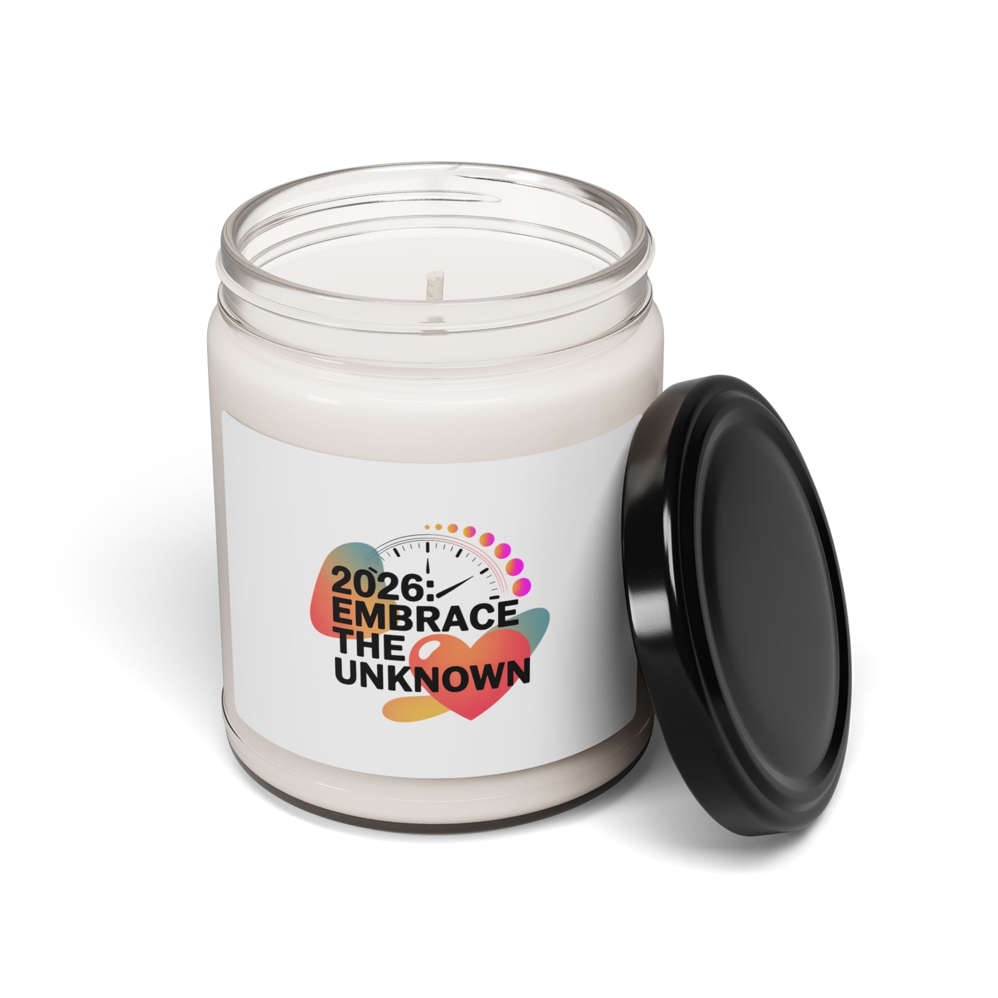 Candle jar with a label reading '2026: Embrace the Unknown' on a white background