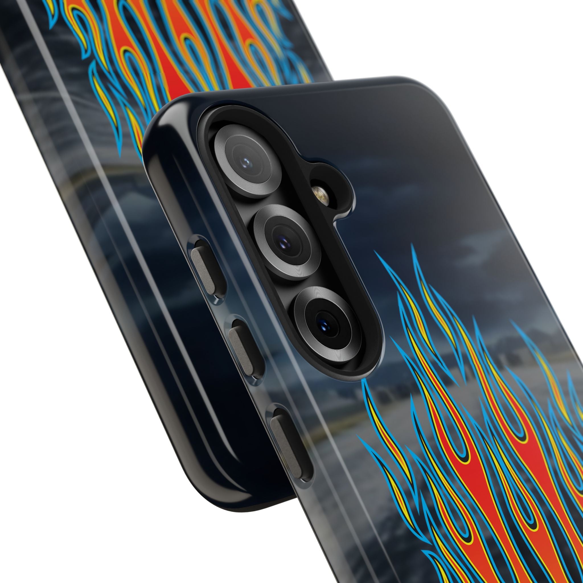 Phone case with flame design and camera details on a reflective surface