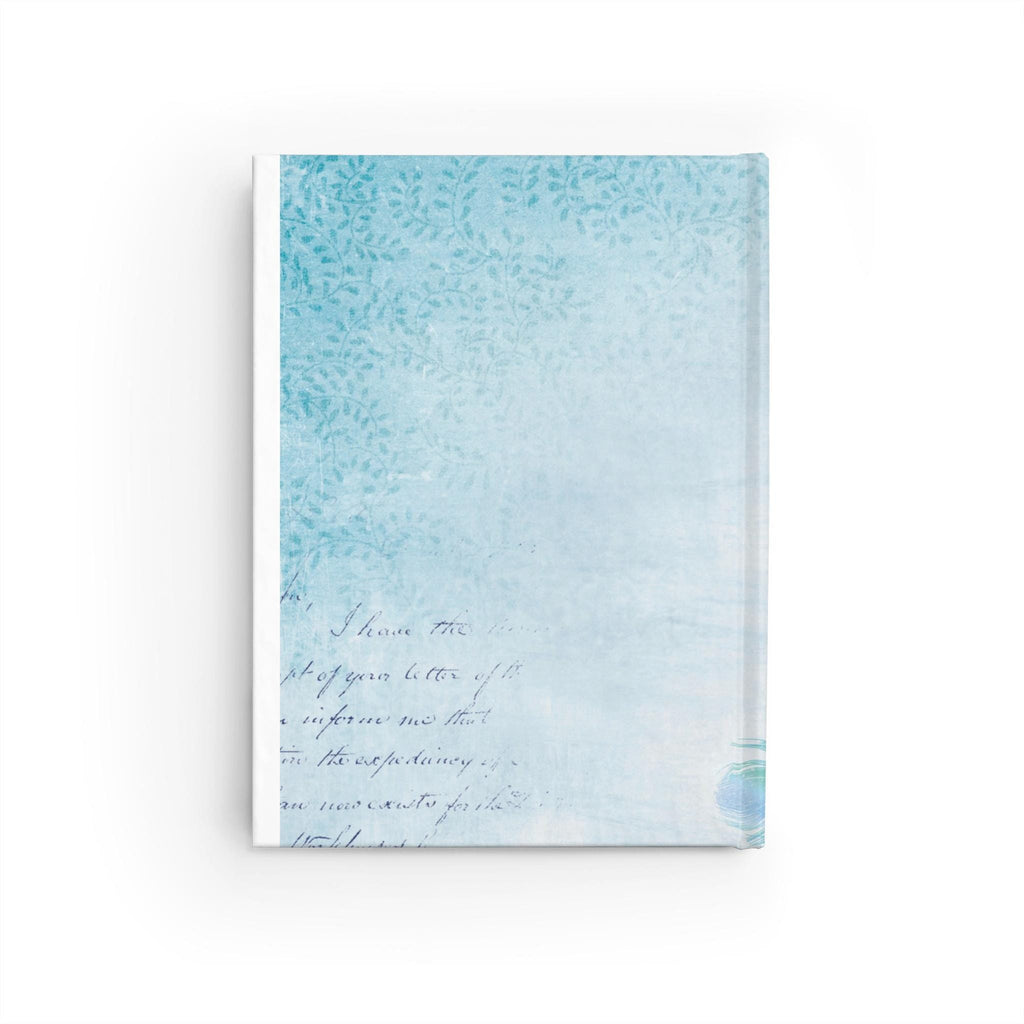 Back cover of a peacock journal in light blue with subtle leaf patterns and script details, showcasing the flexible spine.
