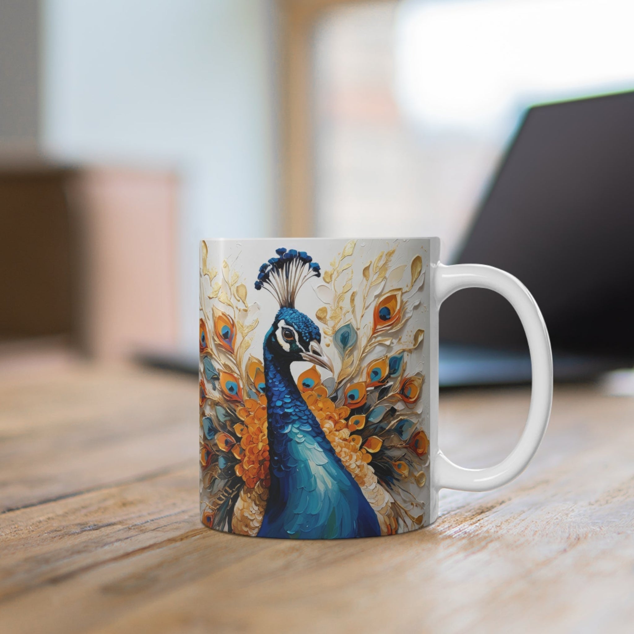 Mug with peacock design on a wooden surface