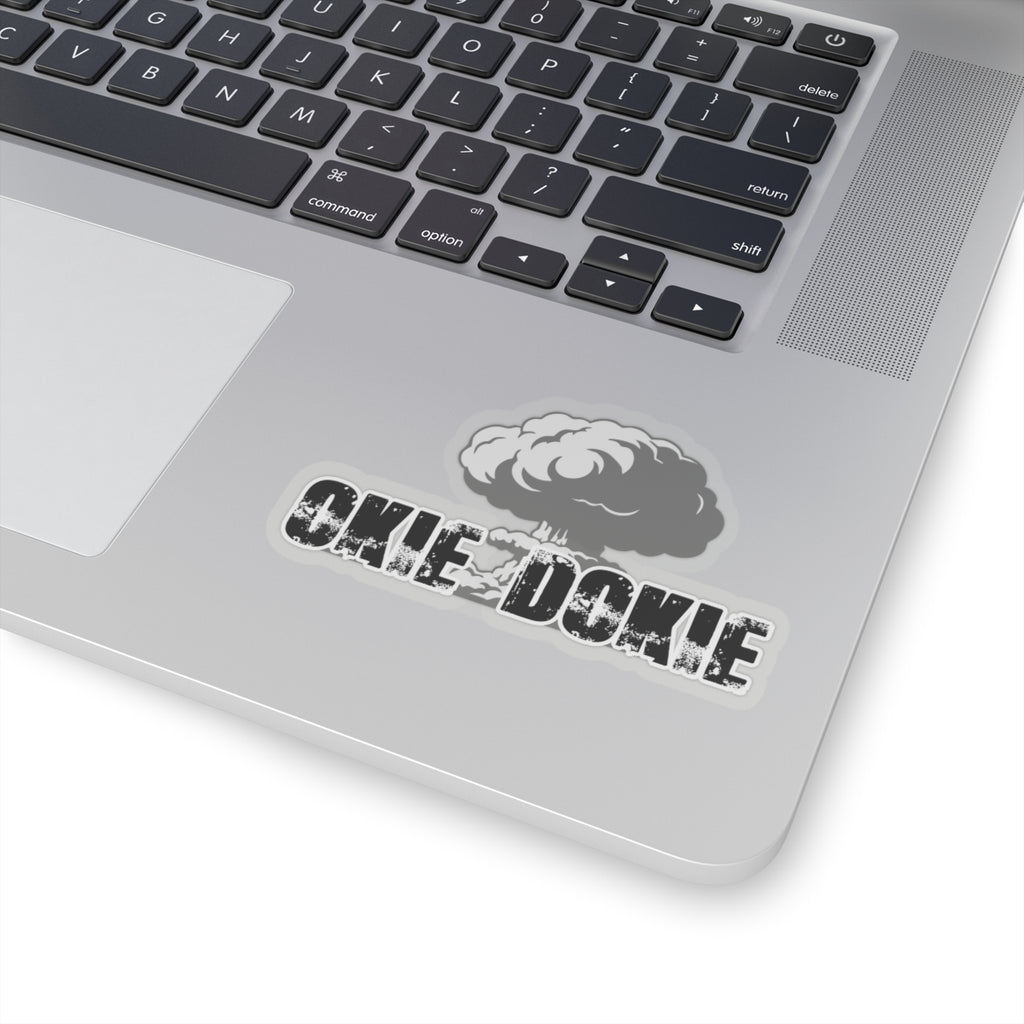 Laptop with 'Okie Dokie' sticker on the palm rest area
