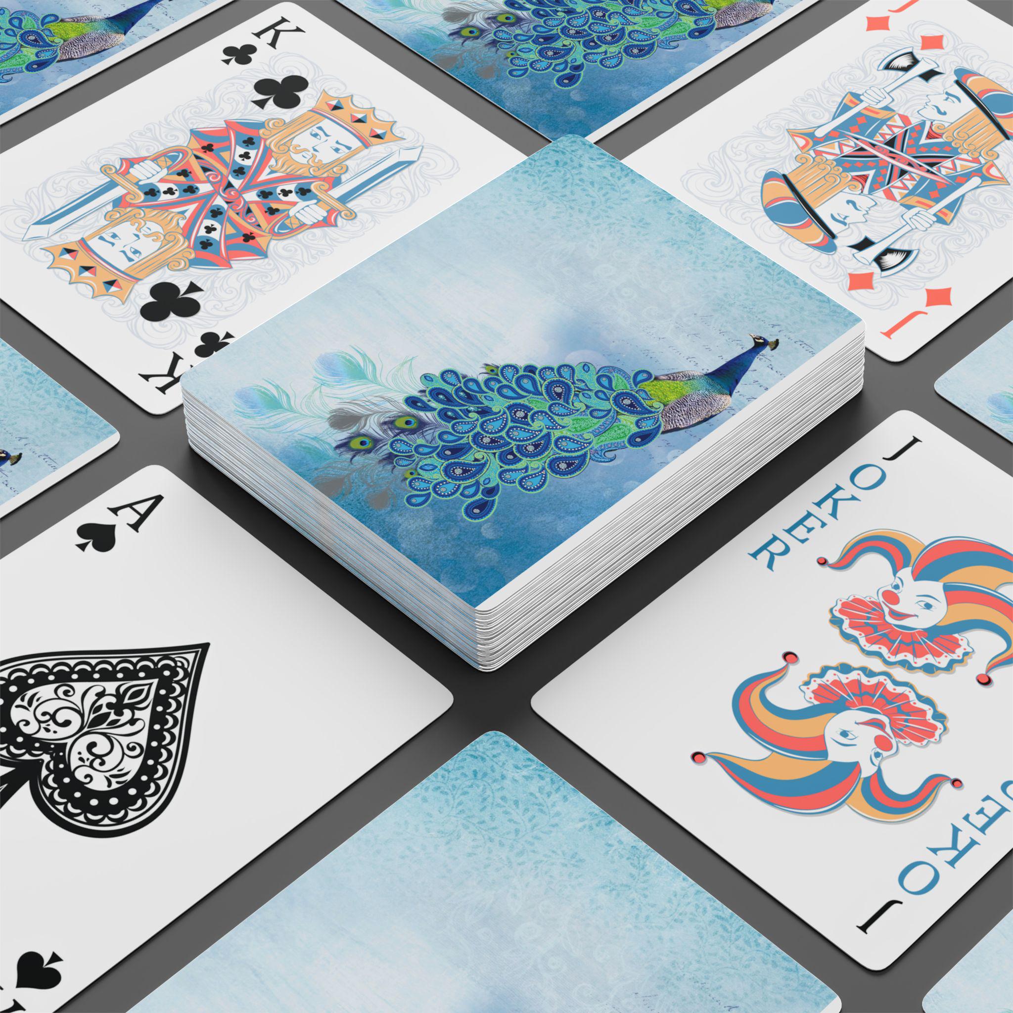 Peacock Poker Deck with blue peacock design, surrounded by King of Clubs, Joker, and Ace of Spades cards.