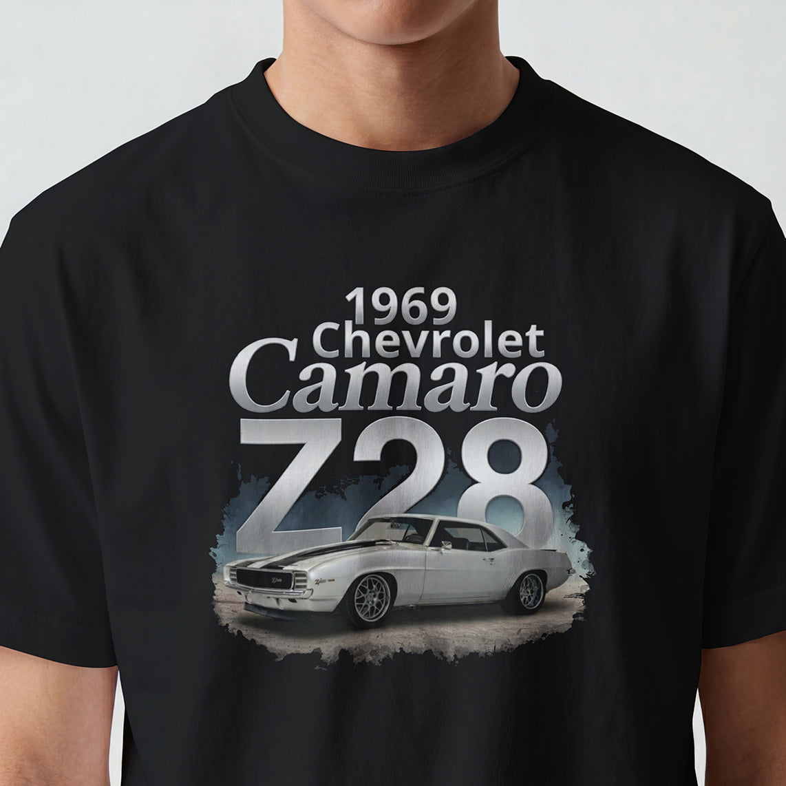 Black t-shirt with 1969 Chevrolet Camaro Z28 graphic on a plain background