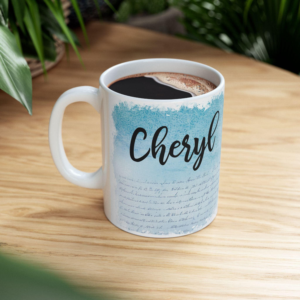 Mug with 'Cheryl' on a wooden surface
