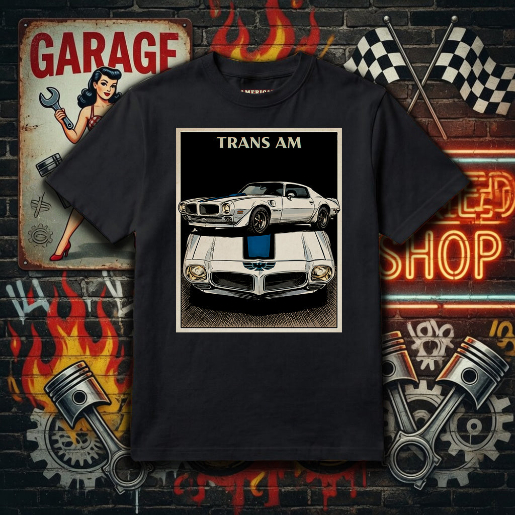 Black t-shirt with a car graphic and 'TRANS AM' text on a garage-themed background.