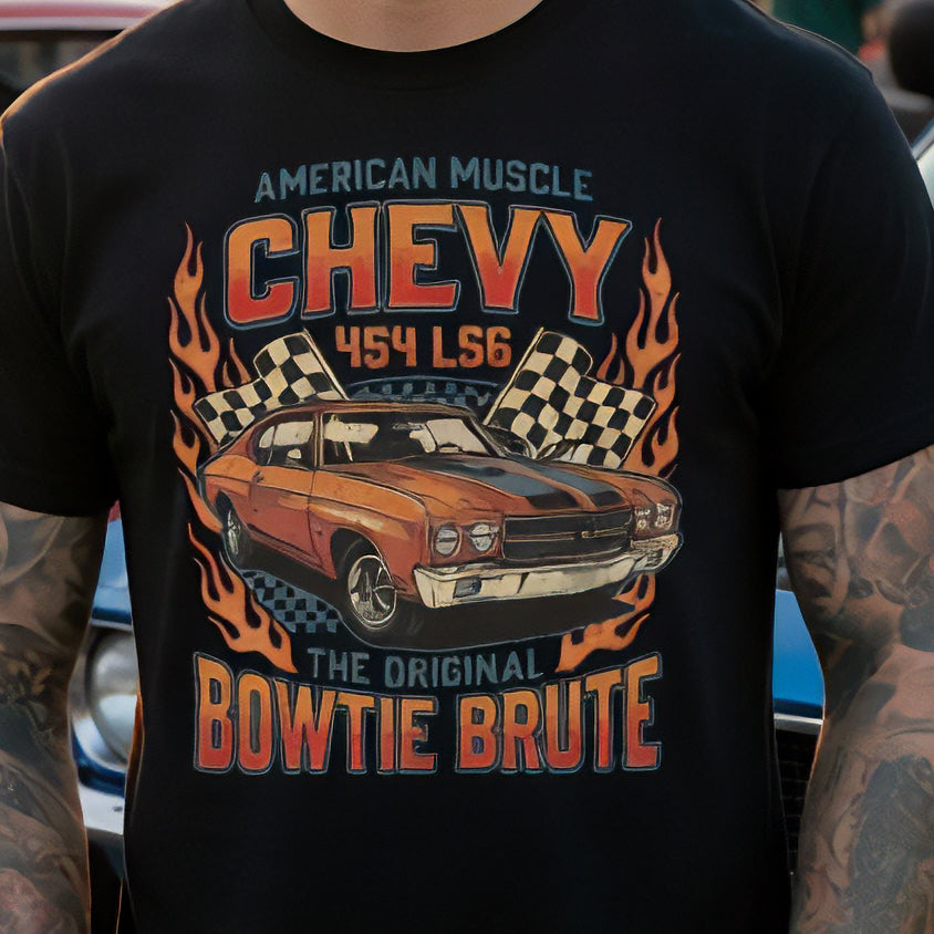 Black t-shirt with a graphic of a vintage car and text, worn by a person with tattoos.