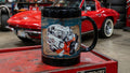 Black mug featuring a detailed print of a Chevy 327 engine, perfect for car enthusiasts.