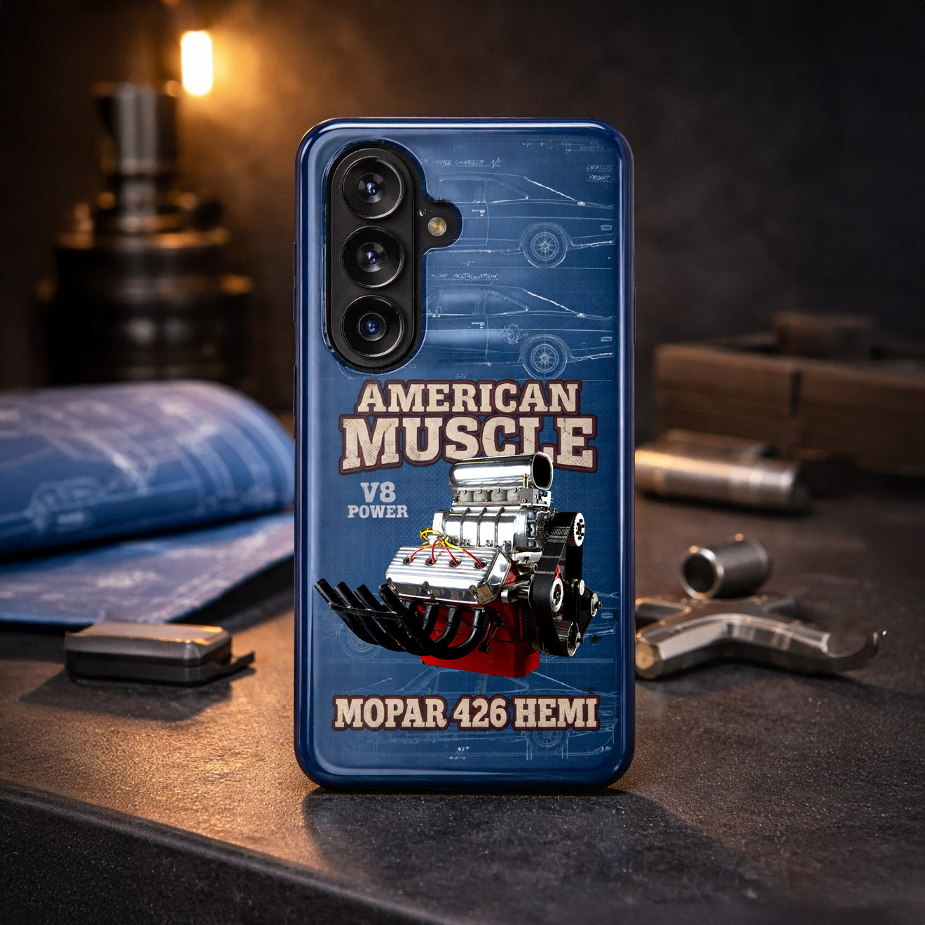 Phone case with American Muscle Mopar 426 HEMI design on a workshop background
