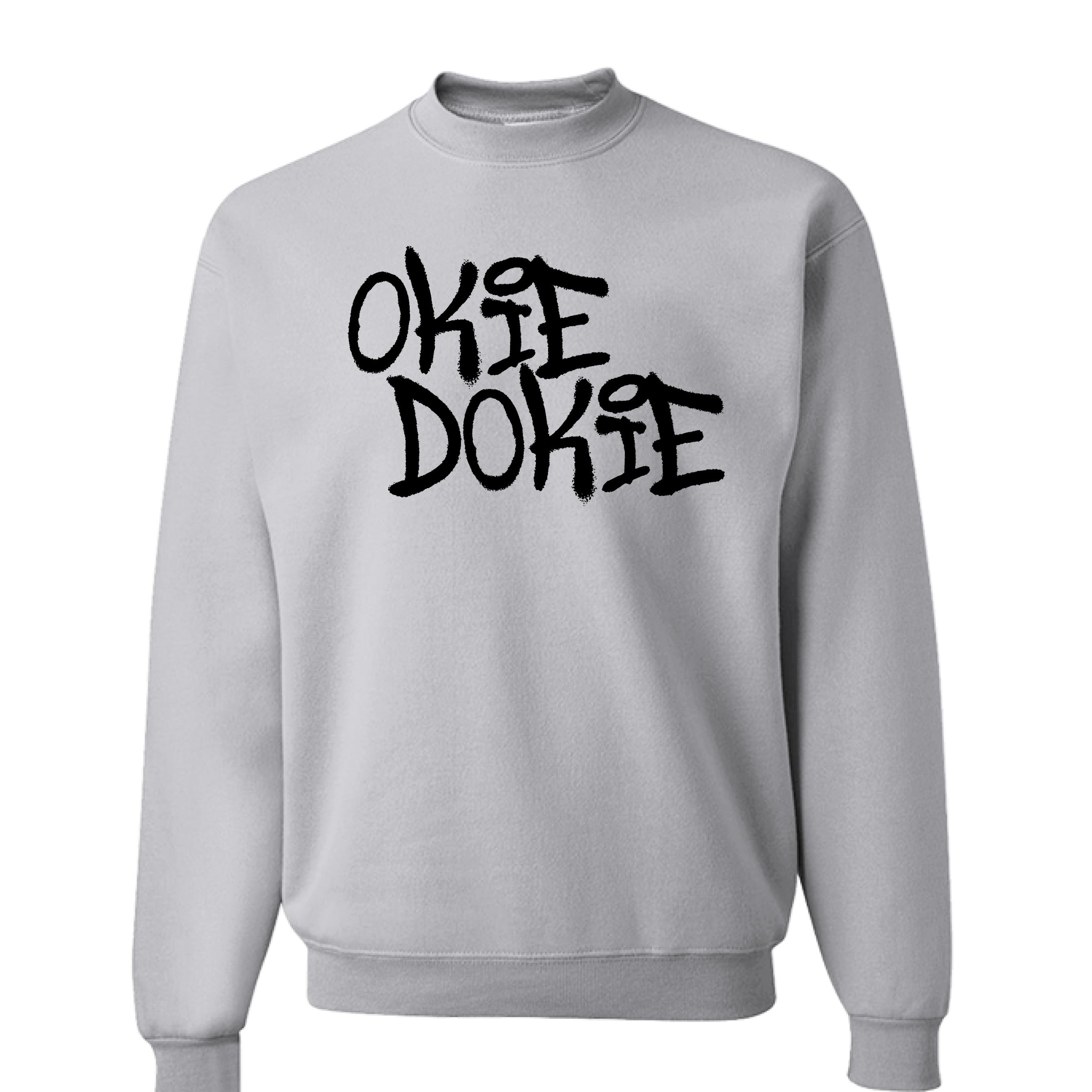 Fallout Amazon Show Ash sweatshirt with 'OKIE DOOKIE' text.